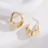 Asymmetrical Textured Metal Hoop Earrings - Cold Tone Aesthetic - Image 4